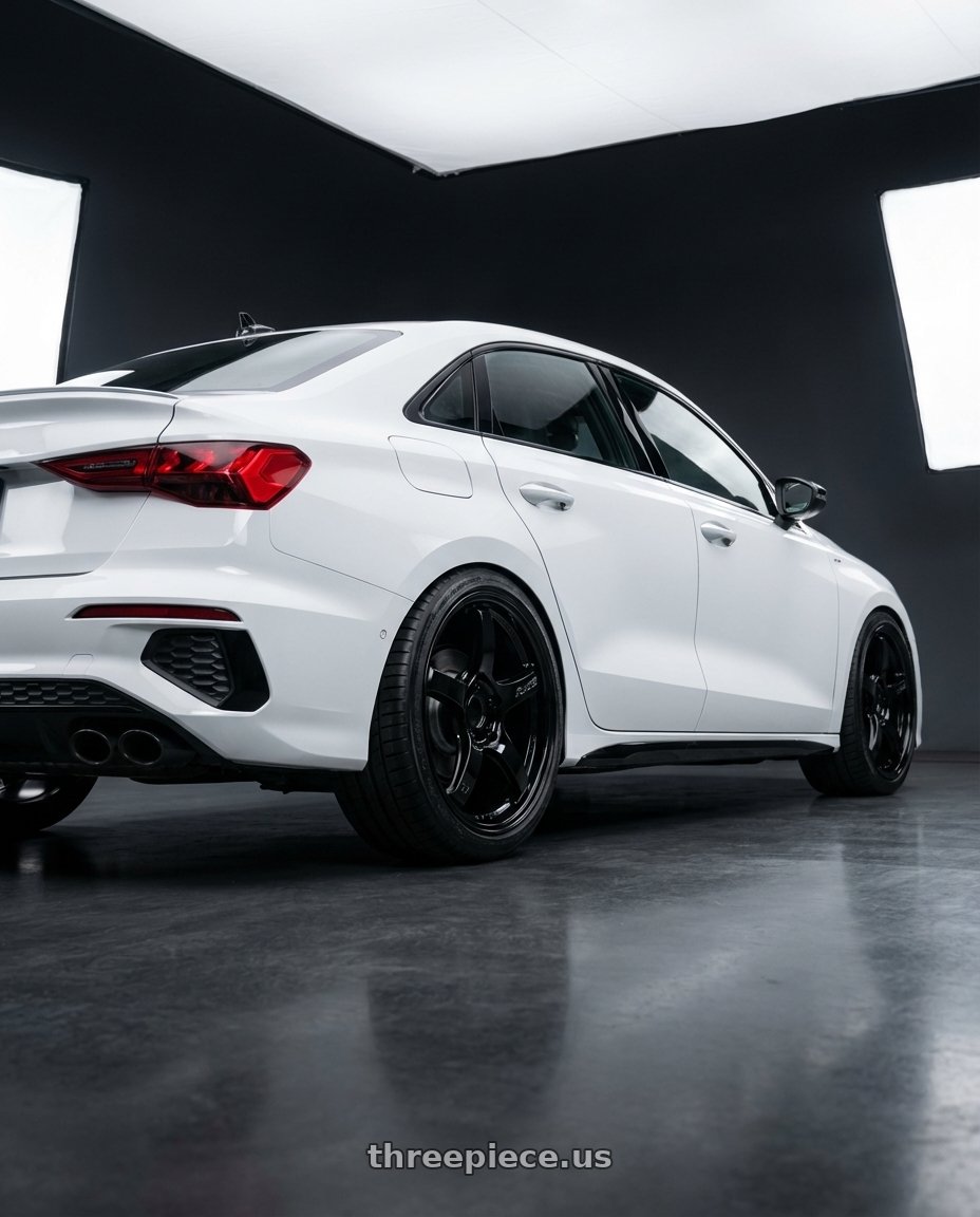 2024 Audi S3 8Y with Gram Lights 57CR 5x112 19x10.5+35 Glossy Black wheels rear three quarter view square tires