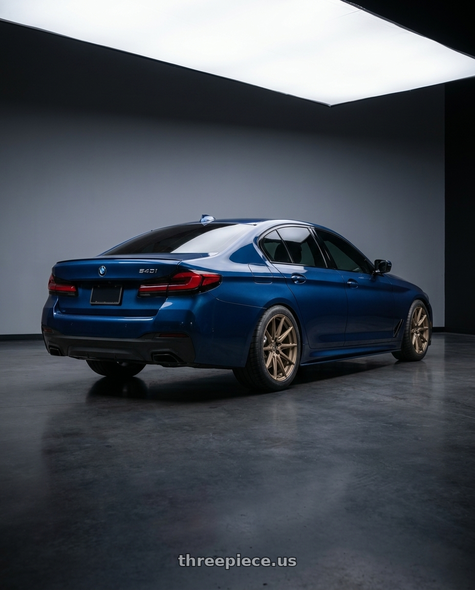 2023 BMW 540i with Brada Wheels CX2 5x112 20x9 +45 Satin Bronze wheels rear three quarter view meaty tires