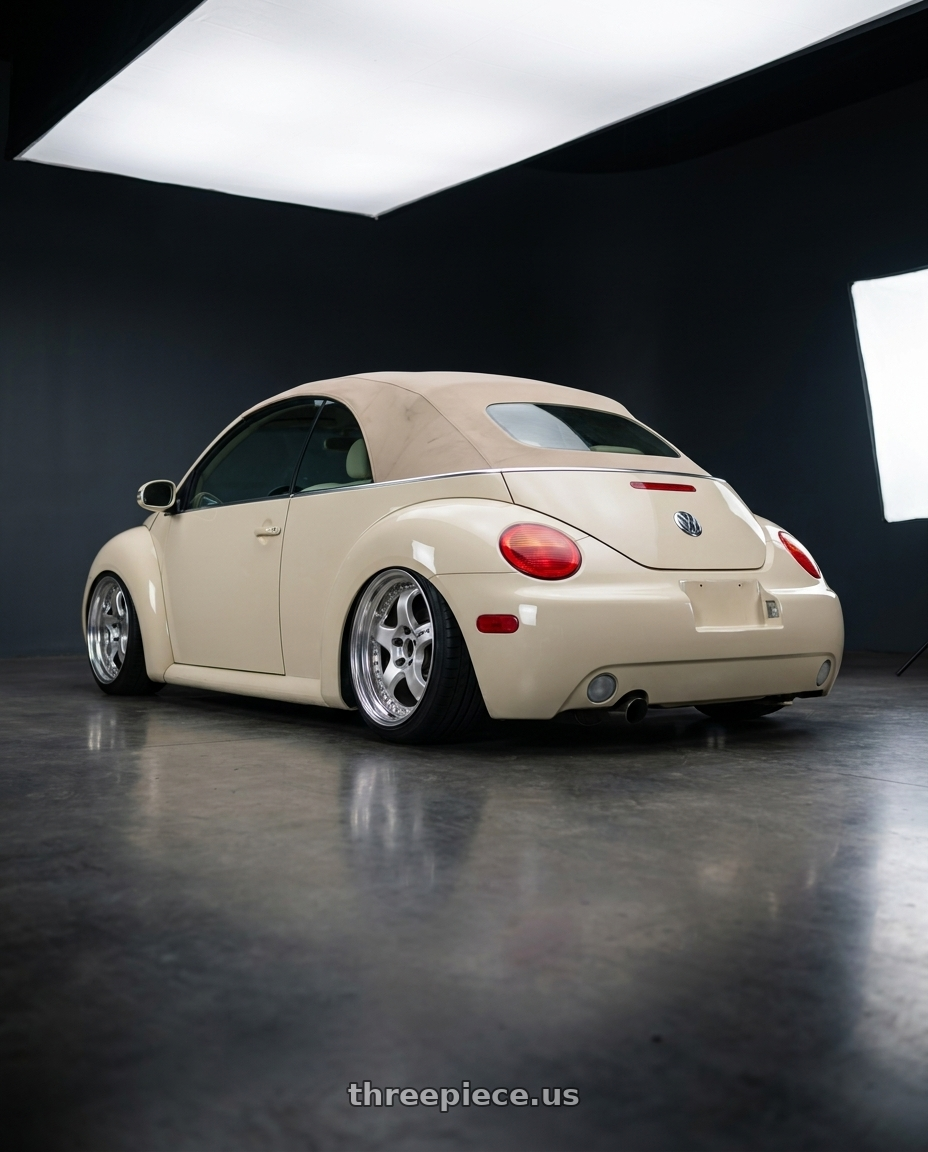 2006 vw beetle with Work Meister S1 3P 5x100 18x8.5+35 L Disk Bright Buff Finish wheels rear three quarter view slight stretch tires