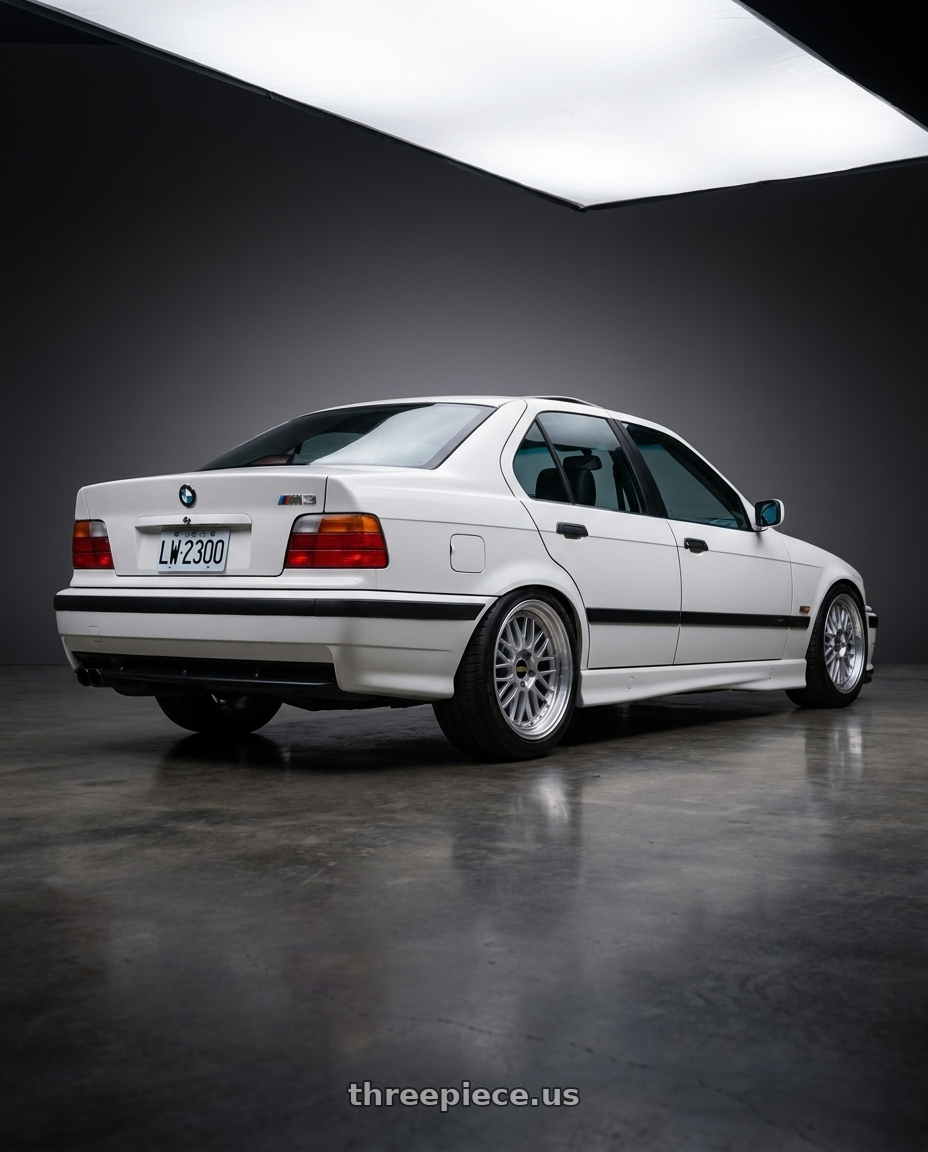 1993 BMW E36M3 with BBS LM 5x114.3 18x9.0+42 Diamond Silver wheels rear three quarter view meaty tires