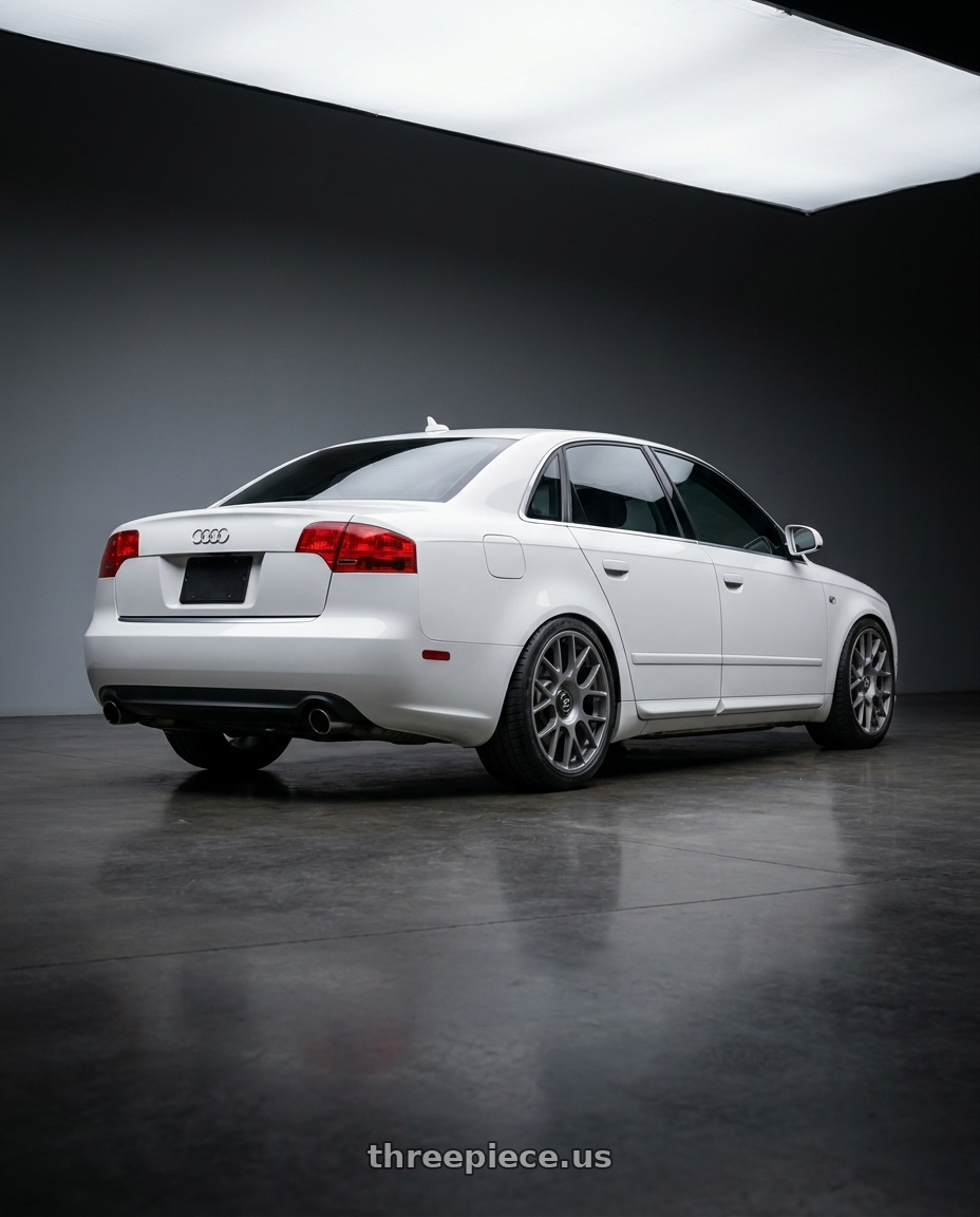 2010 Audi A4 B7 with fifteen52 APEX 5x112 / 5x120 18x8.5 +35 FROSTED GRAPHITE (SATIN GREY) wheels rear three quarter view square tires