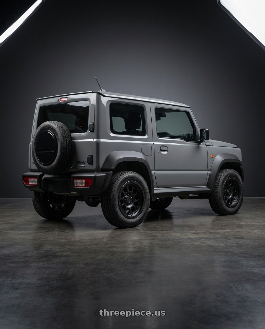 2019 Suzuki Jimny with LOCK OFFROAD 50CAL 5x127 17x9 -12 Matte Black W Matte Black Ring wheels rear three quarter view square tires