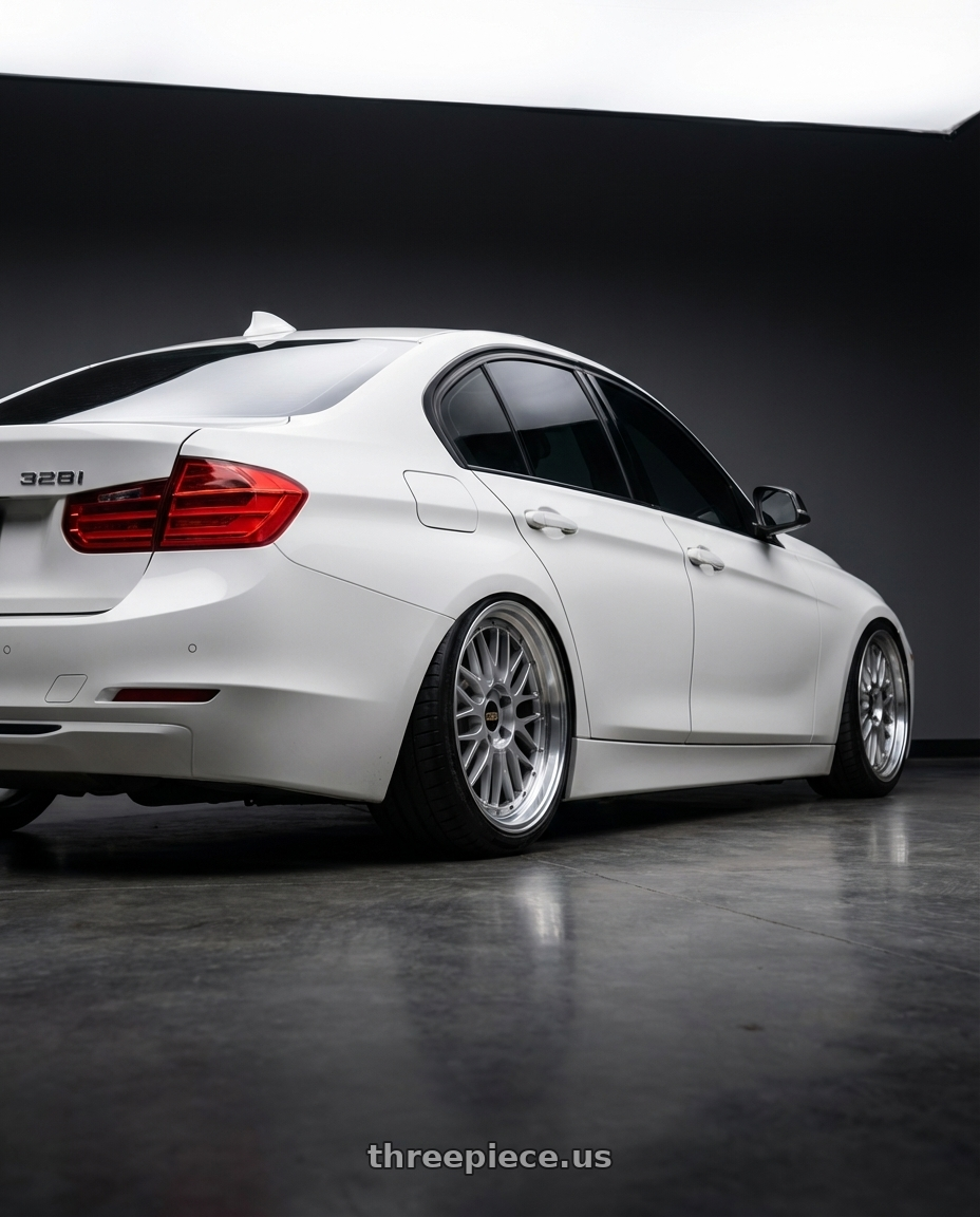 2015 BMW 328i XDrive with BBS LM 5x120 19x9.0+27 Diamond Silver wheels rear three quarter view slight stretch tires