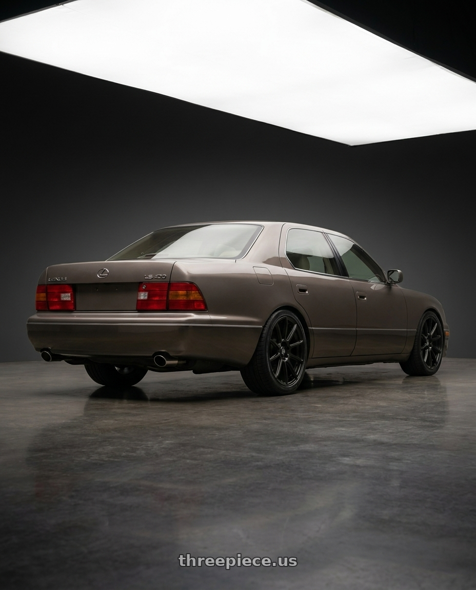 2000 Lexus Ls400 with Konig Control 5x100/5x114.3 18x8+45 Matte Black wheels rear three quarter view square tires