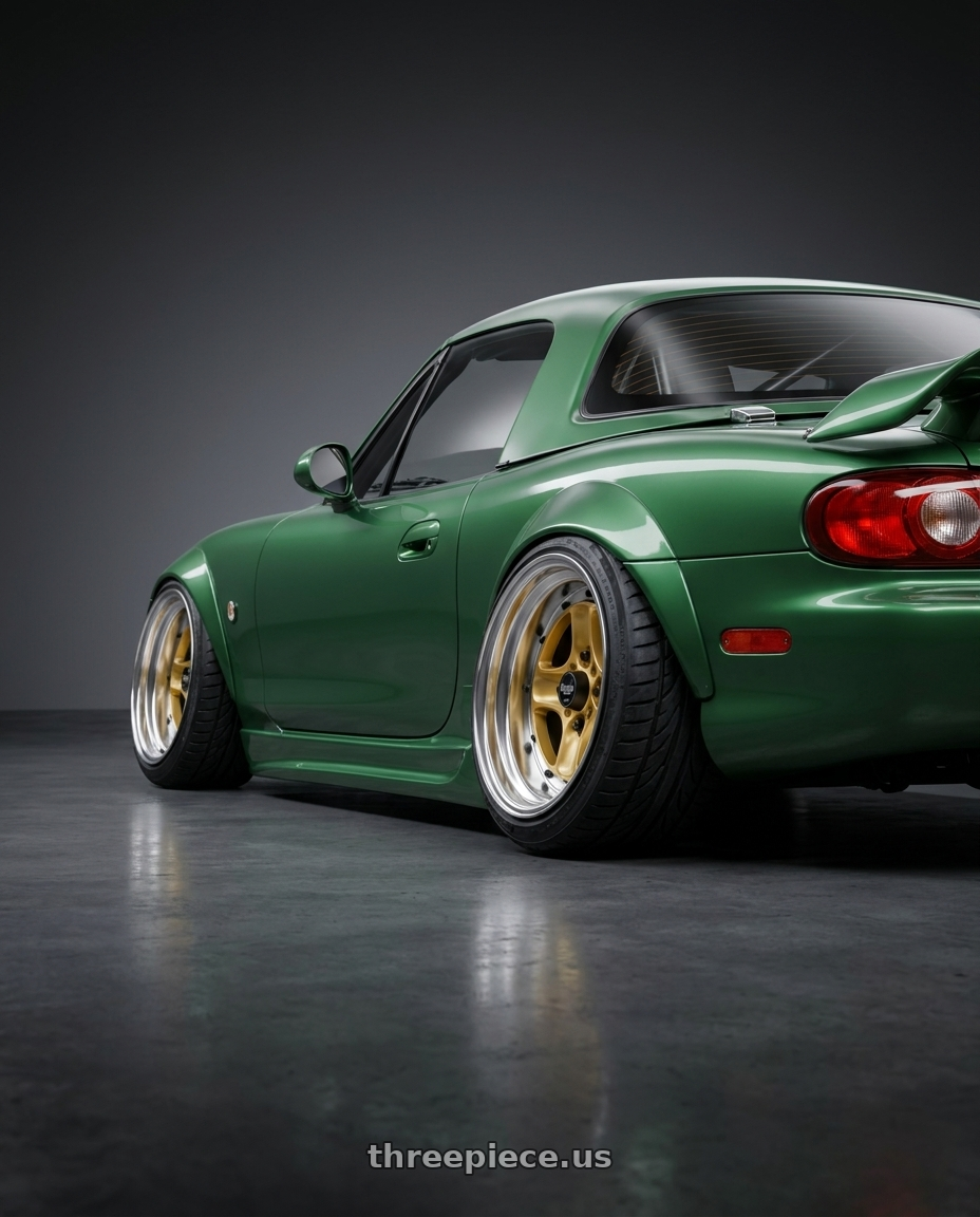 2000 Mazda Miata with Work Equip 40 4x100 15x12 -6 o disk Sprint Gold wheels rear three quarter view extreme stretch tires