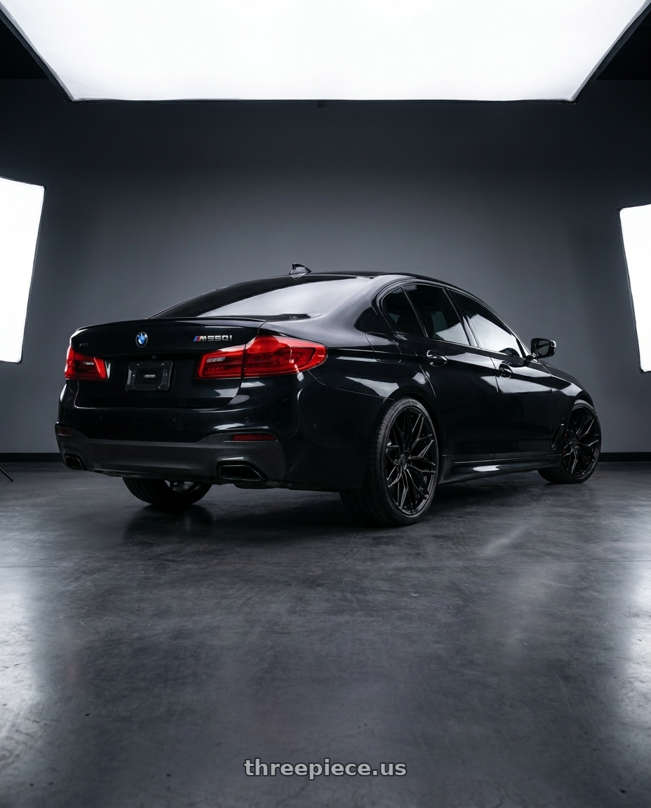 2014 bmw m550i with Brada FR80 5x112 20x9 +35 Satin Black wheels rear three quarter view square tires