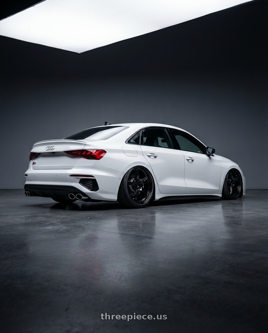 2024 Audi S3 8Y with Gram Lights 57CR 5x112 19x10.5+35 Glossy Black wheels rear three quarter view slight stretch tires