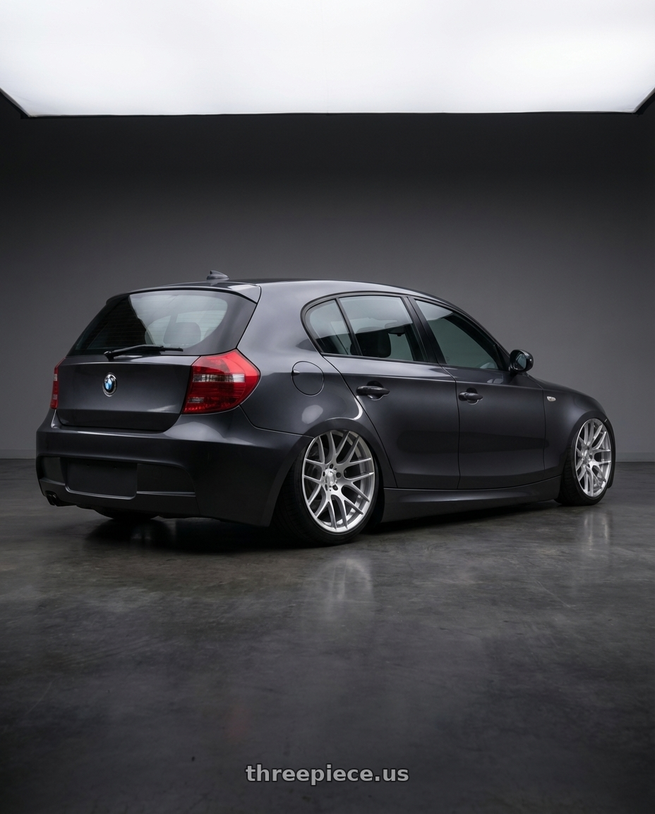 2012 BMW 1 Series E82 with Avant Garde Wheels M359 5X120 19x10 +25 Hyper Silver wheels rear three quarter view slight stretch tires