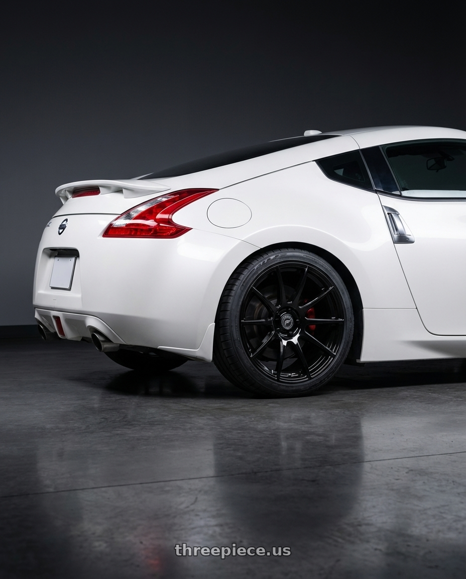 2019 Nissan 370Z with Forgestar CF10 5x114.3 19x9 +35 Gloss Black wheels rear three quarter view square tires