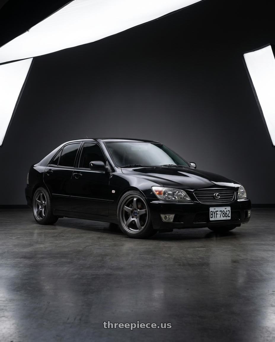 2004 Lexus IS300 with Enkei PF05 5x114.3 17x8+35 Dark Silver wheels front three quarter view lowered stance