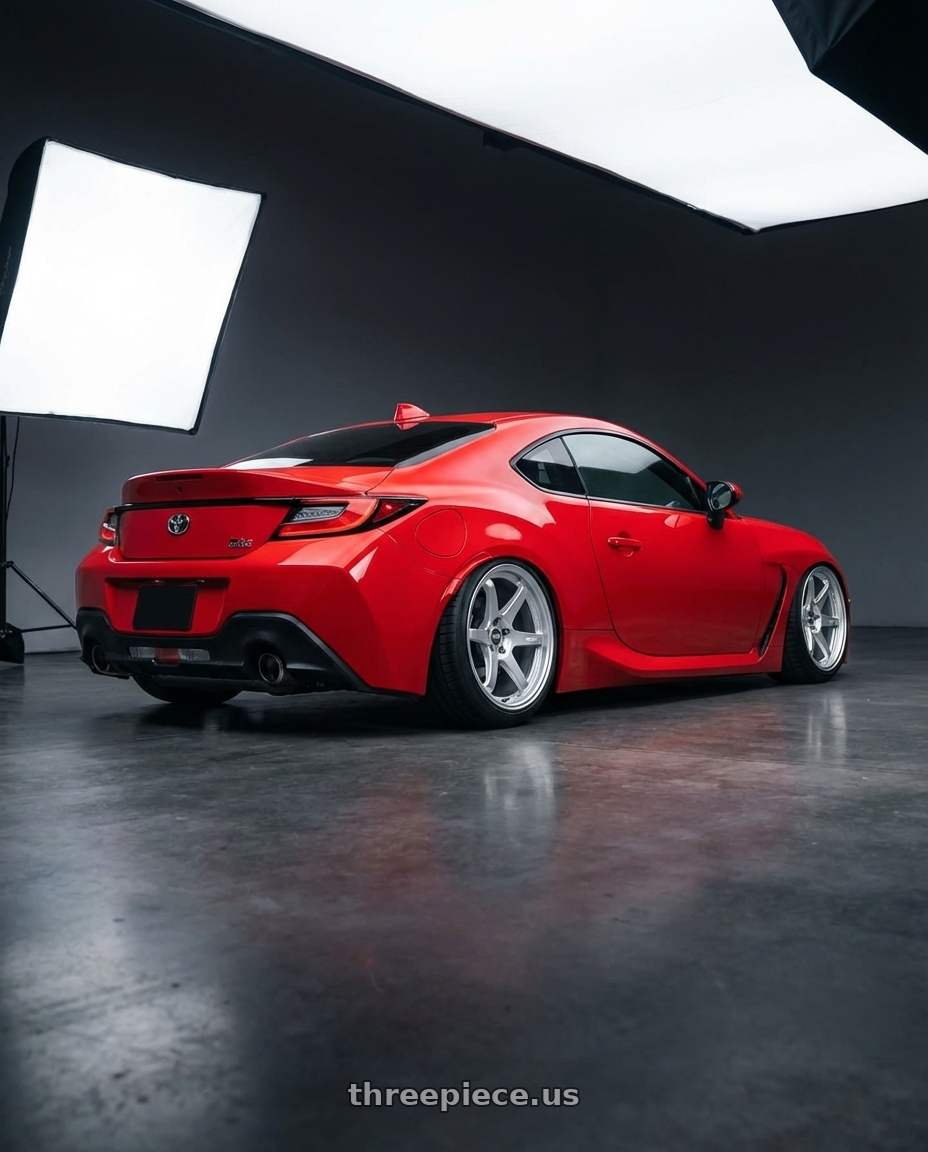 2024 Toyota GR86 with ESR Wheels APEX SERIES AP6 5x114.3 18x9.5 +22 Hyper Silver wheels rear three quarter view slight stretch tires