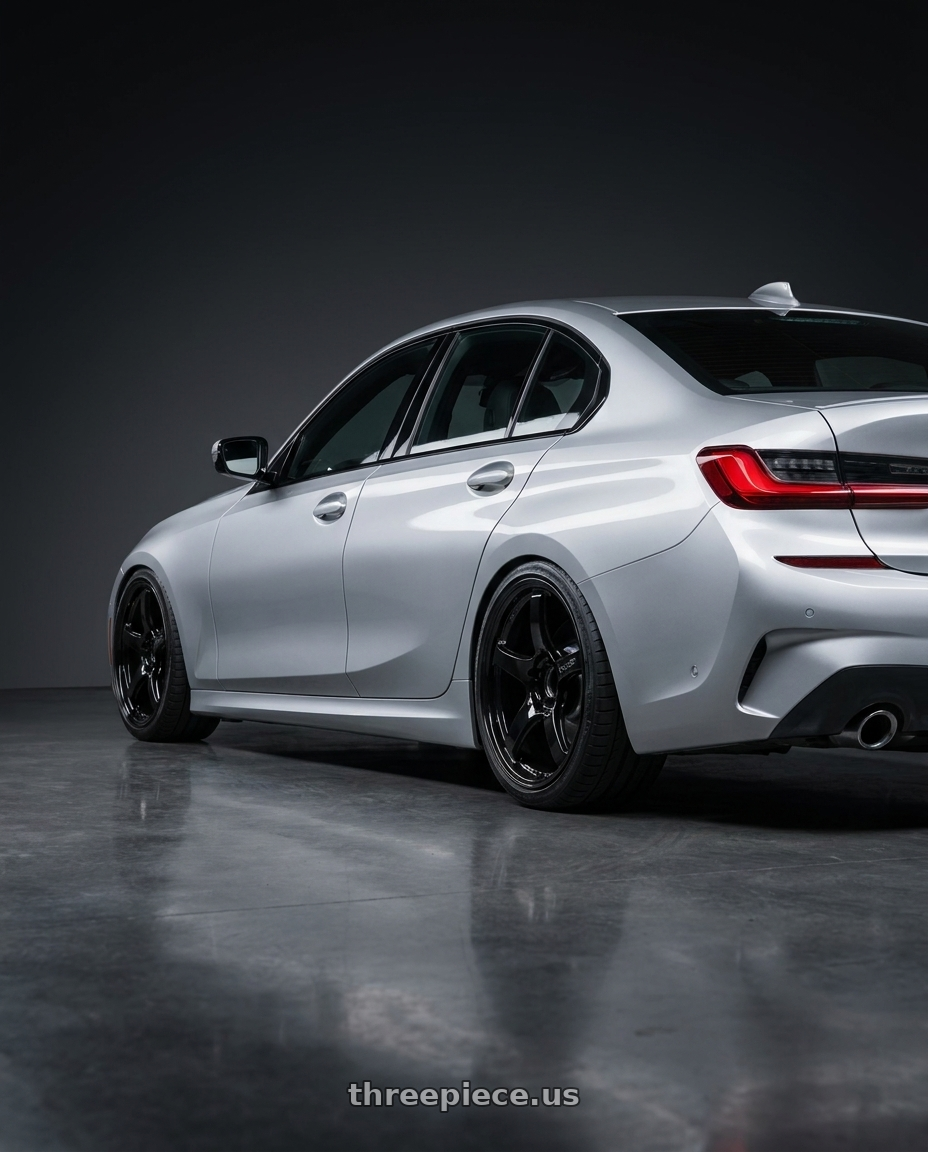 2023 BMW 3 Series G20 with Gram Lights 57CR 5x112 19x10.5+22 Glossy Black wheels rear three quarter view slight stretch tires