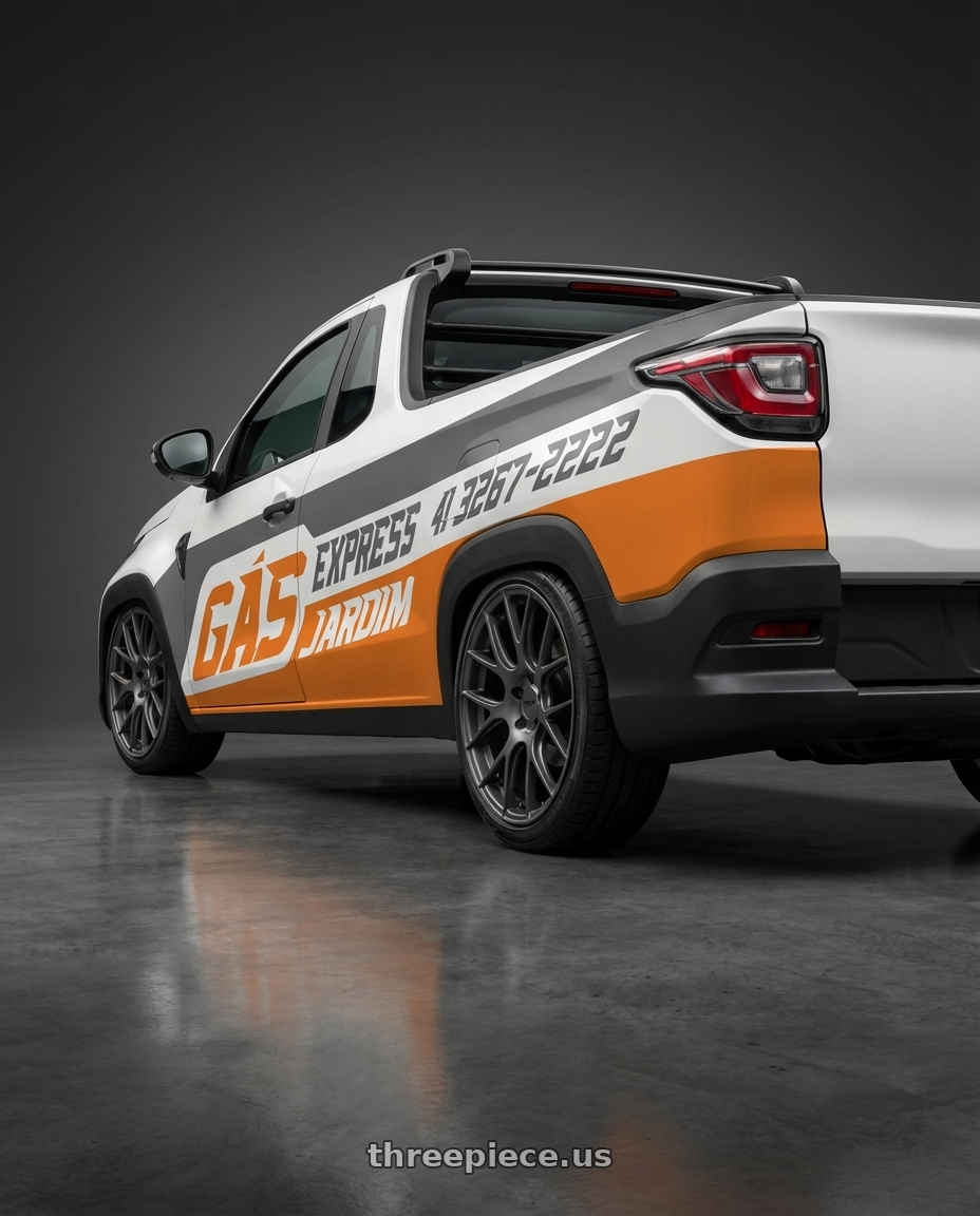 fiat strada endurance 2025 adesivada with TSW NURBURGRING 5X100 17X8 +35 MATTE GUNMETAL wheels rear three quarter view square tires