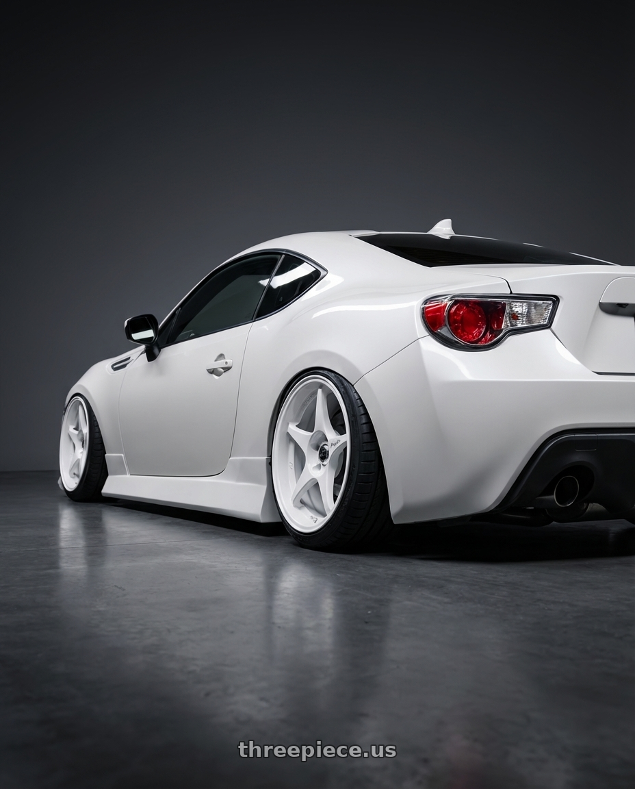 2013 Scion fr-s with Stage Wheels Knight 5x114.3 17x8 +10 White wheels rear three quarter view slight stretch tires