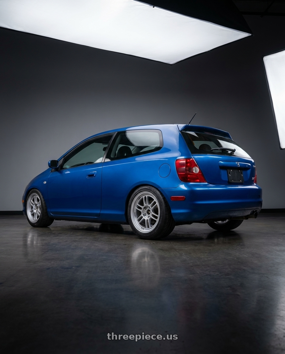 2004 Honda civic with Enkei RPF1 5x114.3 16x7+35 Silver wheels rear three quarter view slight stretch tires
