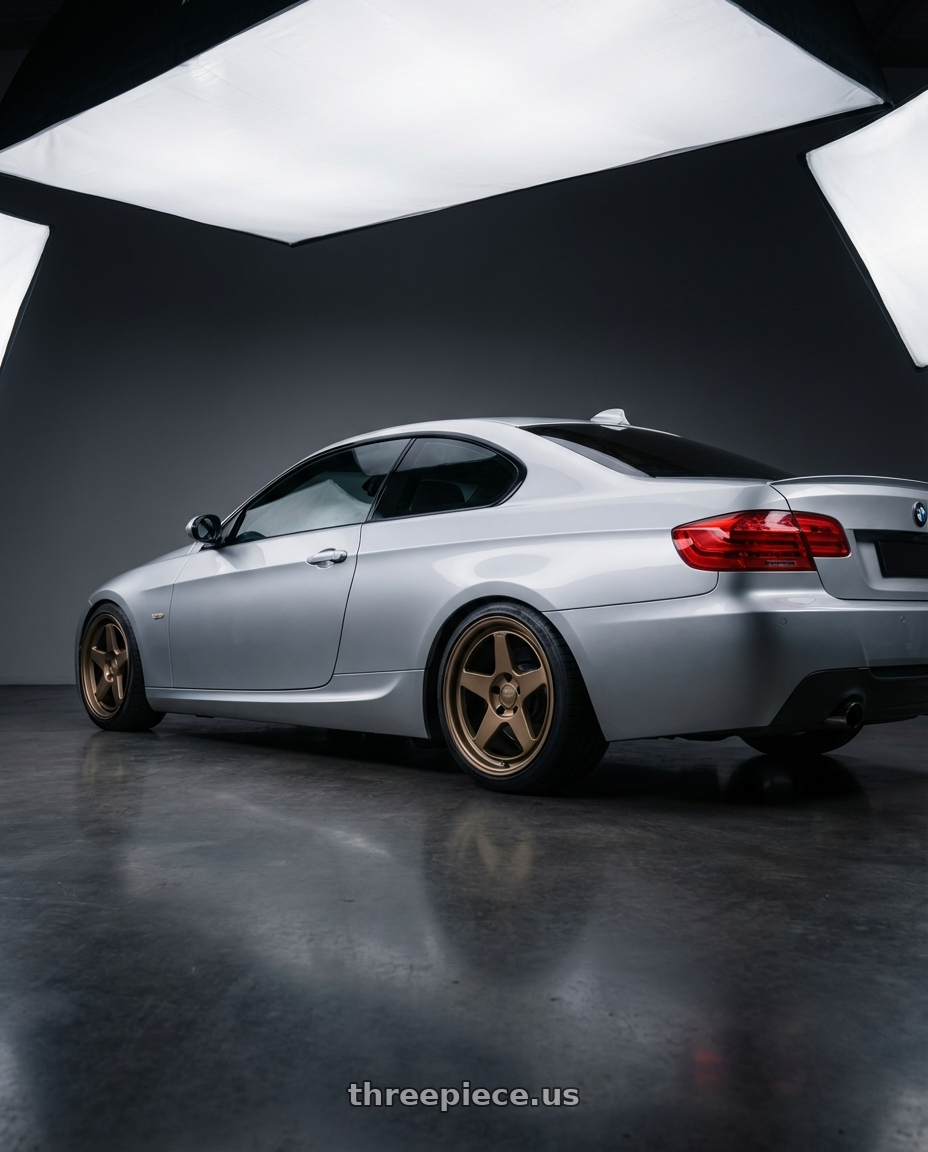 2012 BMW 3 Series E92 with Kansei K12B KNP 5X120 18x8.5 35 Bronze wheels rear three quarter view square tires