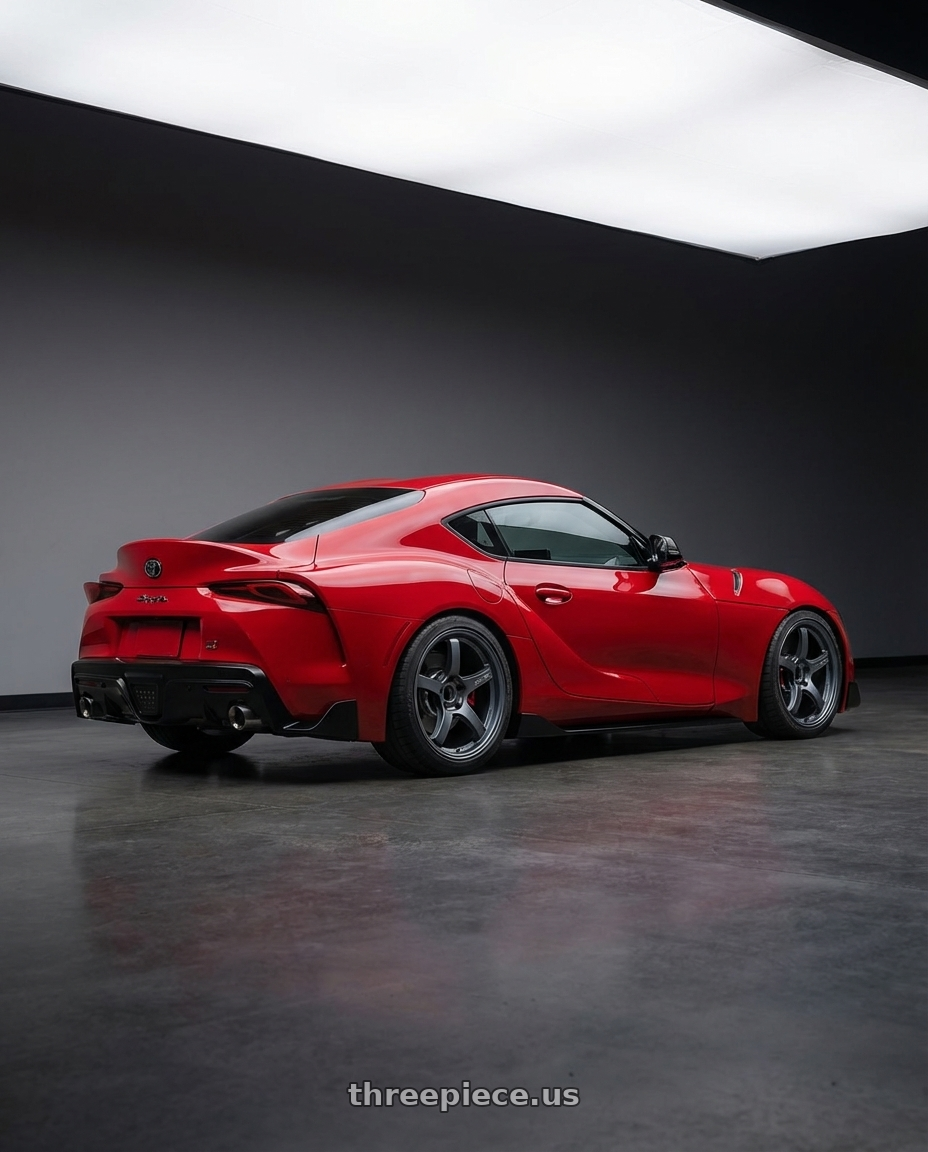 2023 Toyota GR Supra with Gram Lights 57CR 5x112 19x8.5+45 Gunblue II wheels rear three quarter view square tires