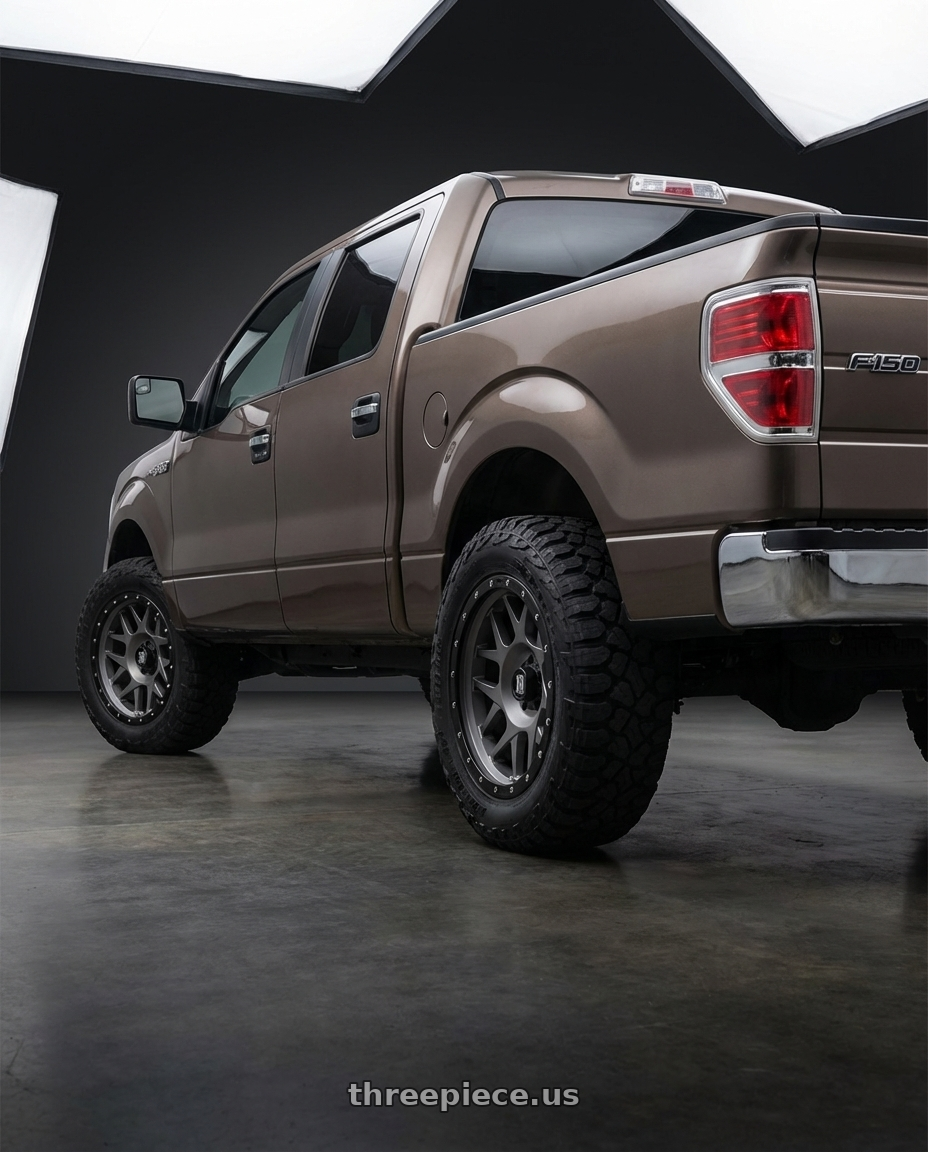 2013 Ford F-150 with XD XD127 BULLY 6X135 20X9 +0 MATTE GRAY BLACK RING wheels rear three quarter view meaty tires