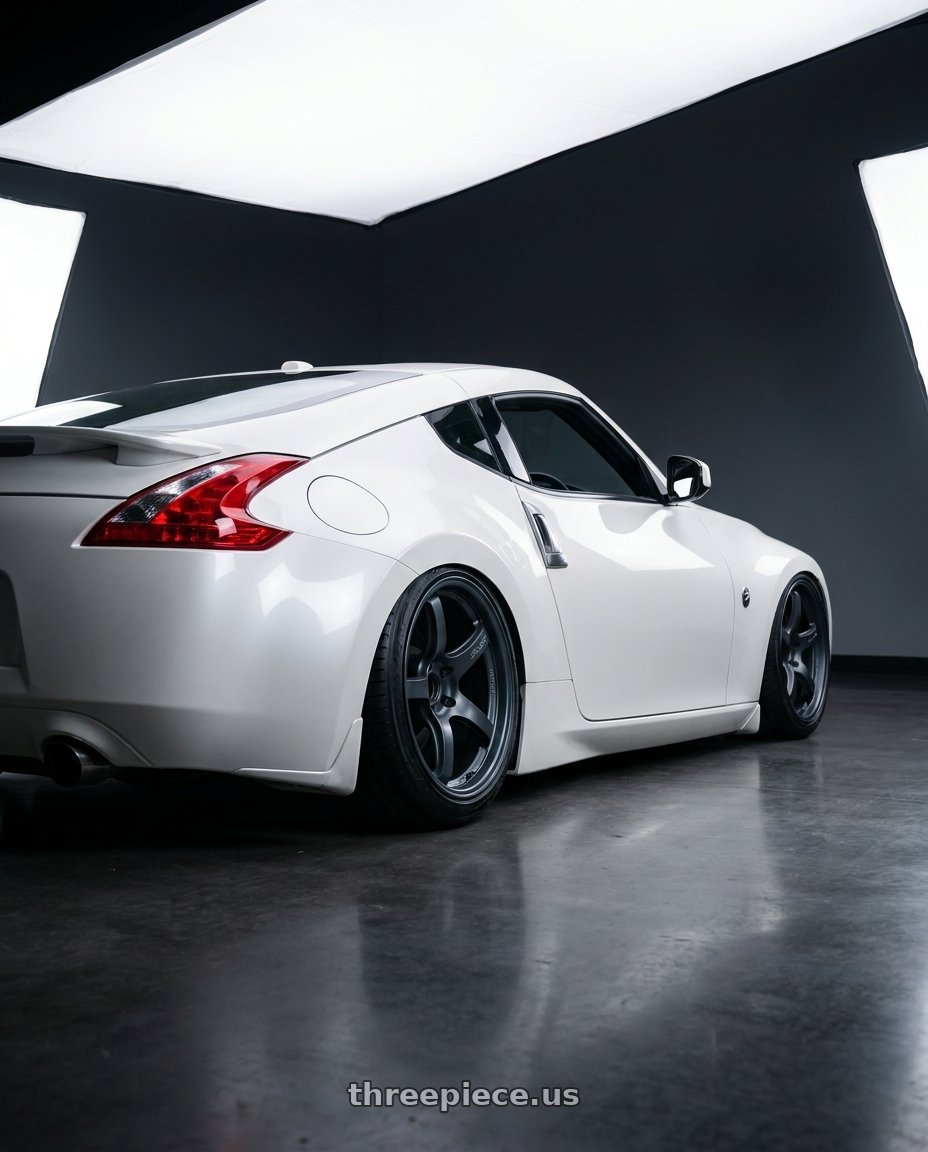 2019 Nissan 370Z with Gram Lights 57CR 5x114.3 19x10.5+35 Gunblue II wheels rear three quarter view slight stretch tires