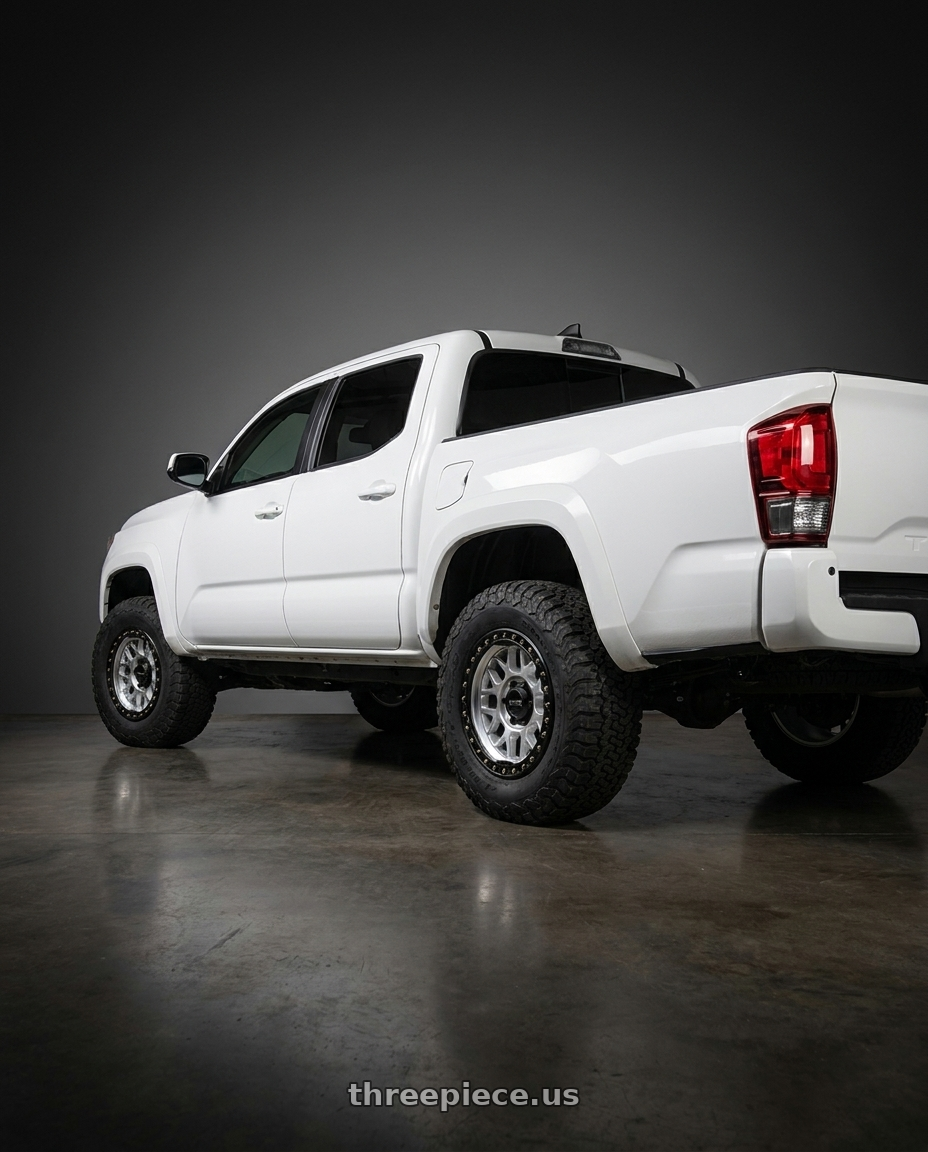 2023 Toyota Tacoma sr5 white  with KMC KM549 GRS 6X139.7 17X9 -12 MACHINED WITH SATIN BLACK LIP wheels rear three quarter view meaty tires