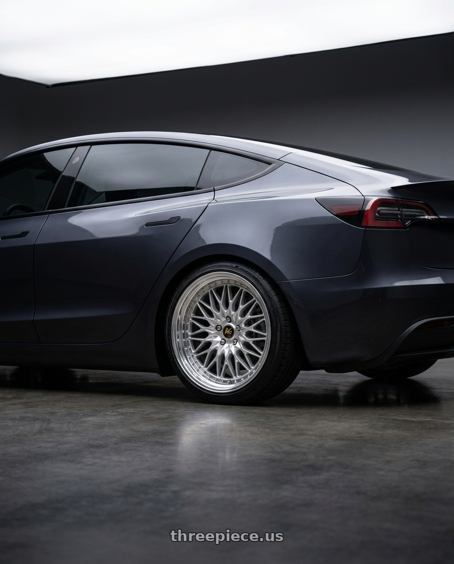 2024 tesla model 3 long with Work Vs-Xv 5x114.3 20x9.5+47 A Disk Silky Rich Silver wheels rear three quarter view slight stretch tires