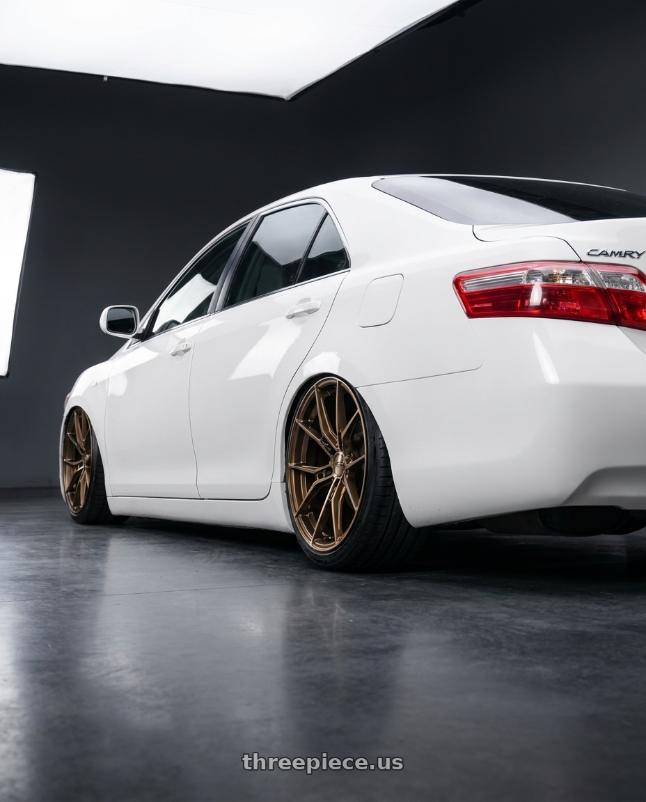 2008 Toyota camry 20 e with E5 Wheels Daytona 5x120 20x9+38 BRONZE wheels rear three quarter view slight stretch tires