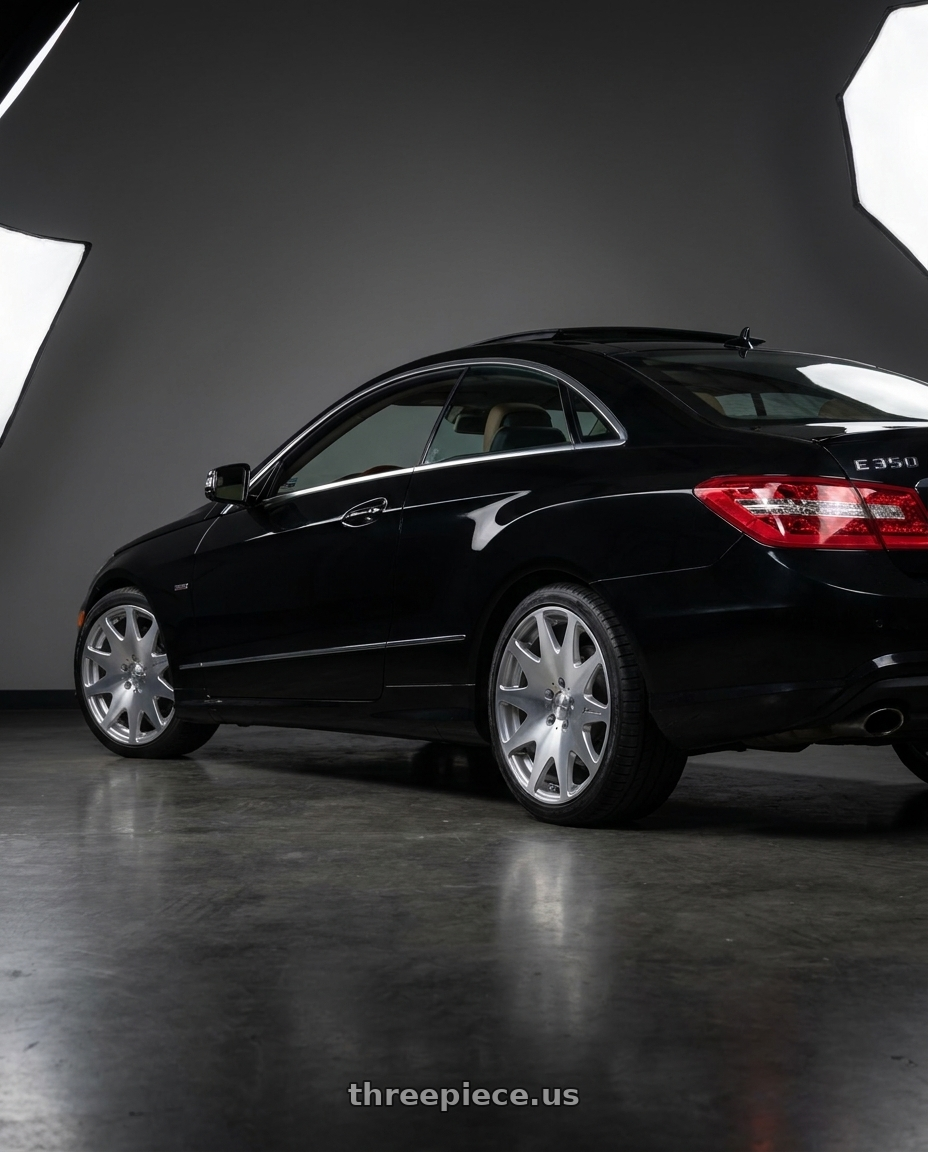 2013 Mercedes-Benz E350 4Matic with MRR HR3 5x112 19x8.5  +32 Silver Machine Face wheels rear three quarter view square tires