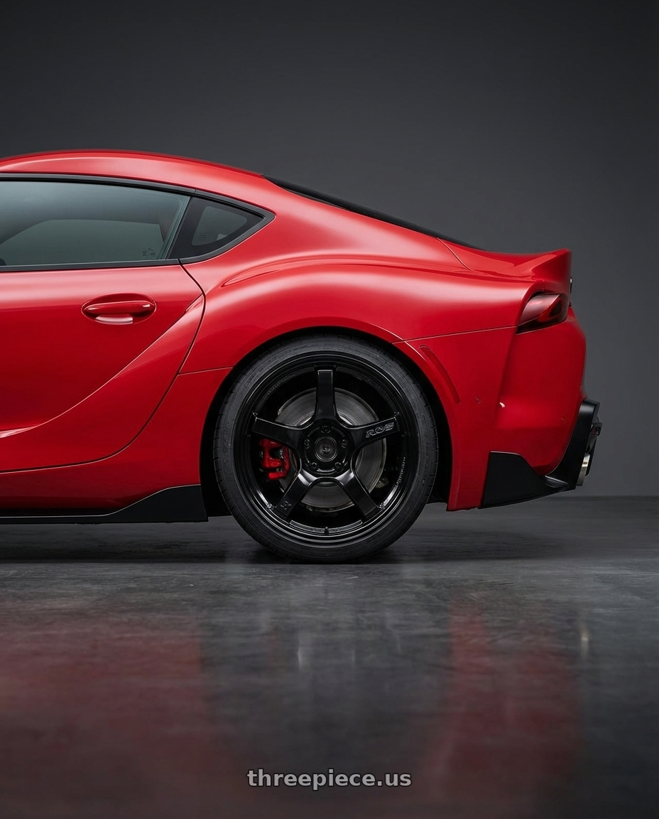 2023 Toyota GR Supra with Gram Lights 57CR 5x112 19x10.5+35 Glossy Black wheels rear three quarter view square tires