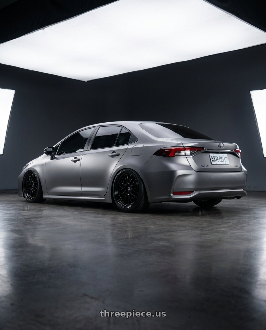 2022 Toyota altis with Work Zistance W10m 5x114.3 19x8.5+0 r disk Black wheels rear three quarter view square tires