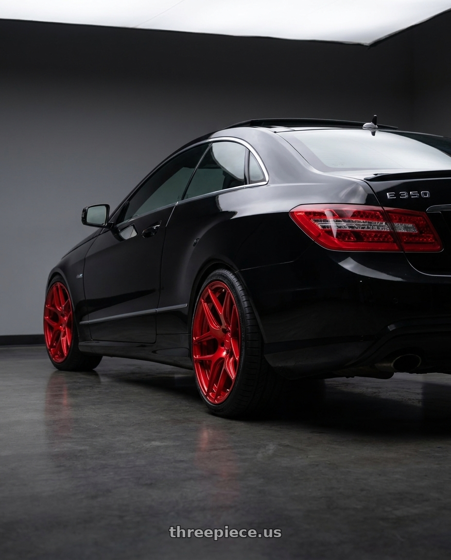 2013 Mercedes-Benz E350 4Matic with MRR FS1 5x112 18x8.5  +35 Candy Red wheels rear three quarter view square tires
