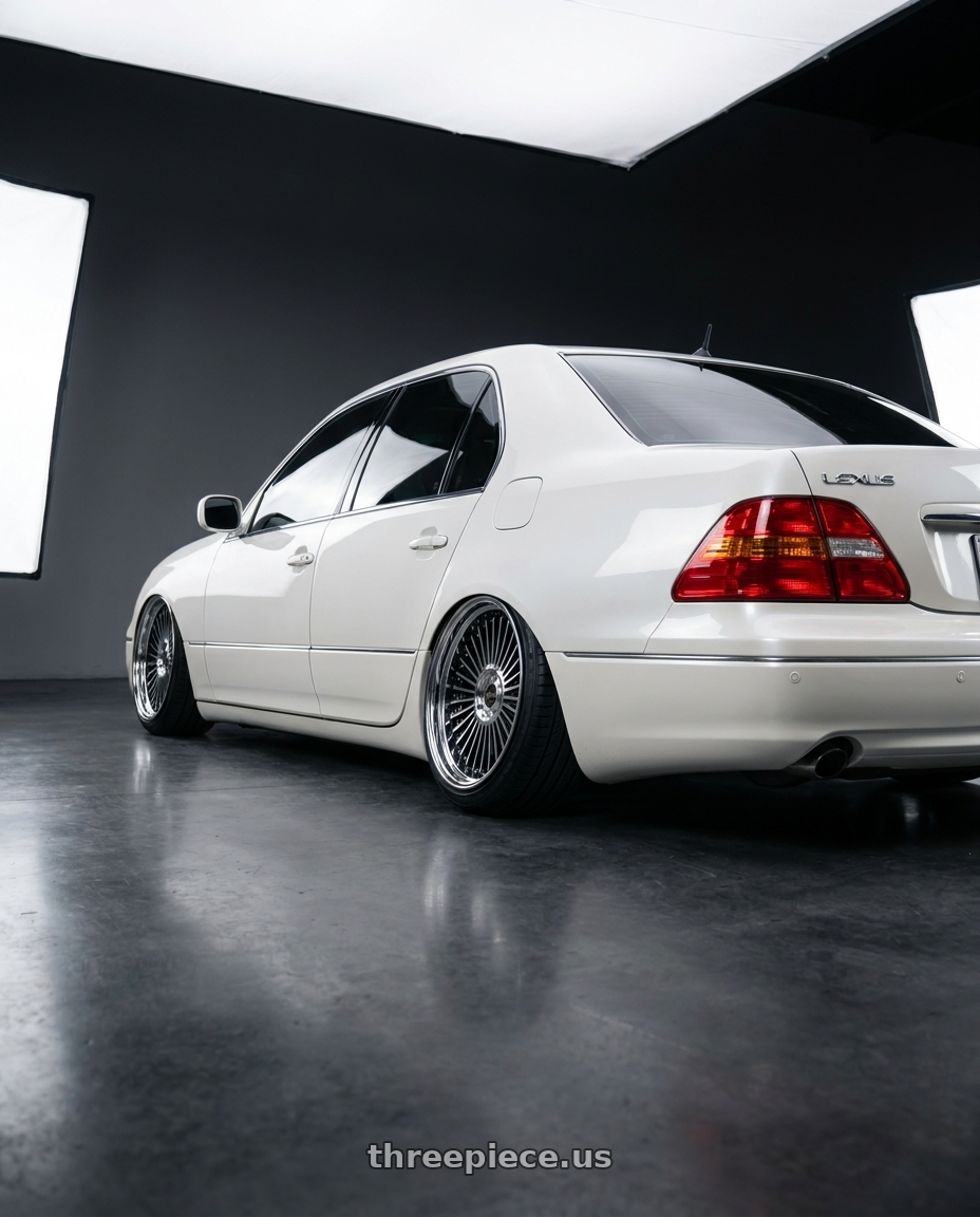 2001 Lexus LS 430 with Work Emitz Black Polish 5x114.3 19x7.5 +45 wheels rear three quarter view slight stretch tires