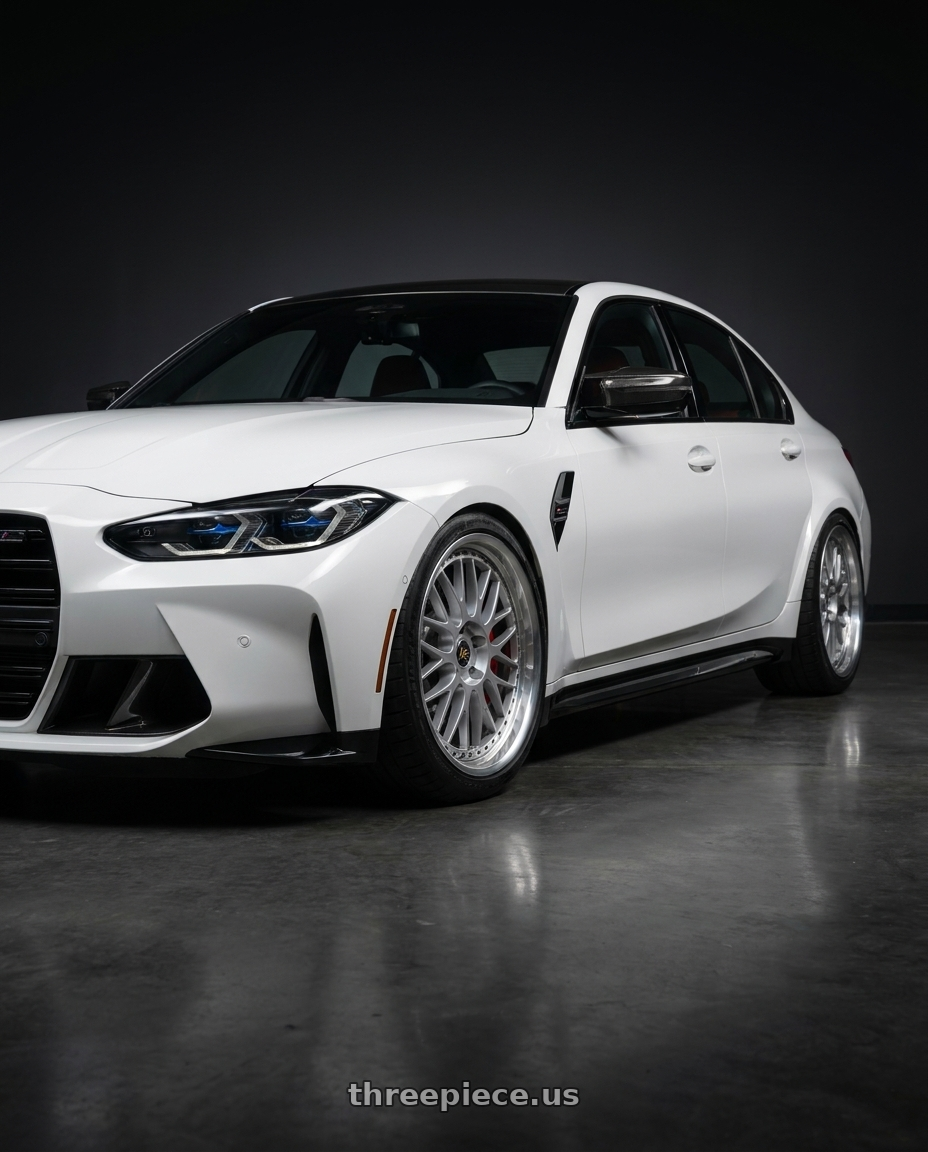 2026 BMW M3 Competition with Work Vs-Xx 5x112 20x10.5+13 O Disk Light Grey Silver wheels front three quarter view lowered stance