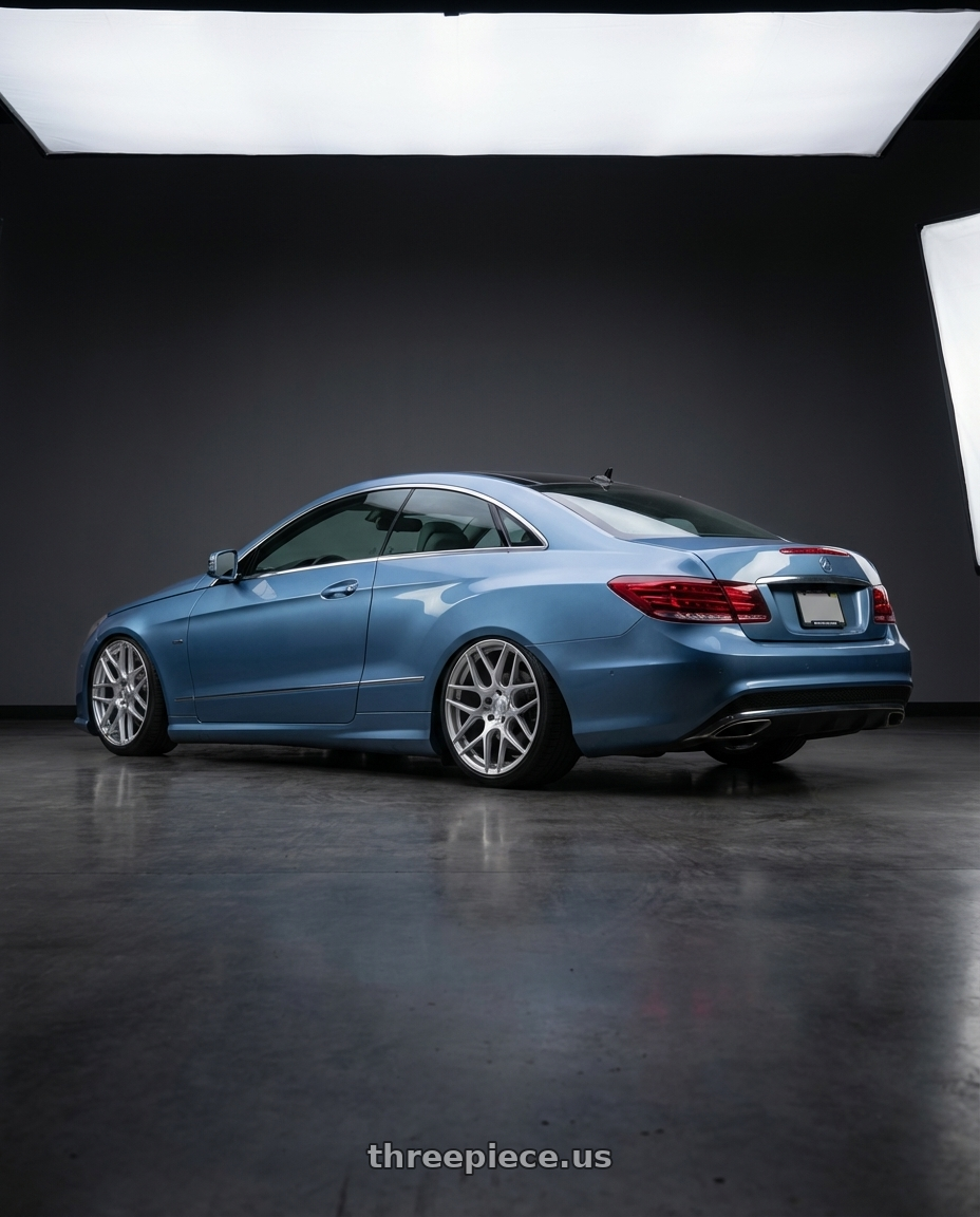 2014 Mercedes-Benz E-Class Coupe C207 with Aodhan AFF2 5x112 20x9+30 Gloss Silver Machined Face wheels rear three quarter view slight stretch tires