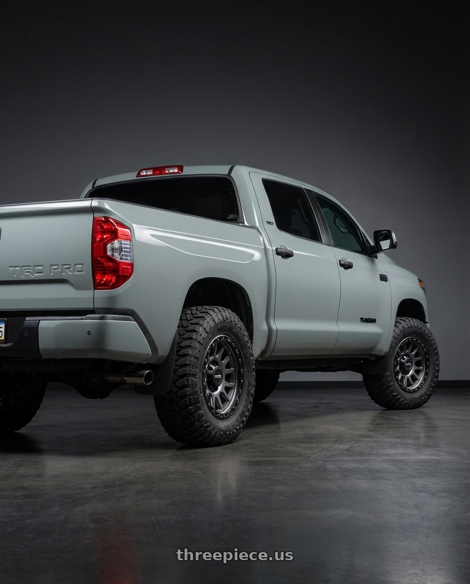 2018 Toyota Tundra with Vision Off-Road 111 Nemesis 5x150 20x9+18 Gunmetal wheels rear three quarter view meaty tires