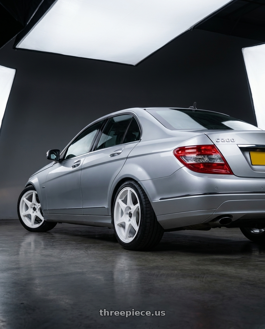 2007 Mercedes C200 with Stage Wheels Knight 5x114.3 17x8 +10 White wheels rear three quarter view square tires