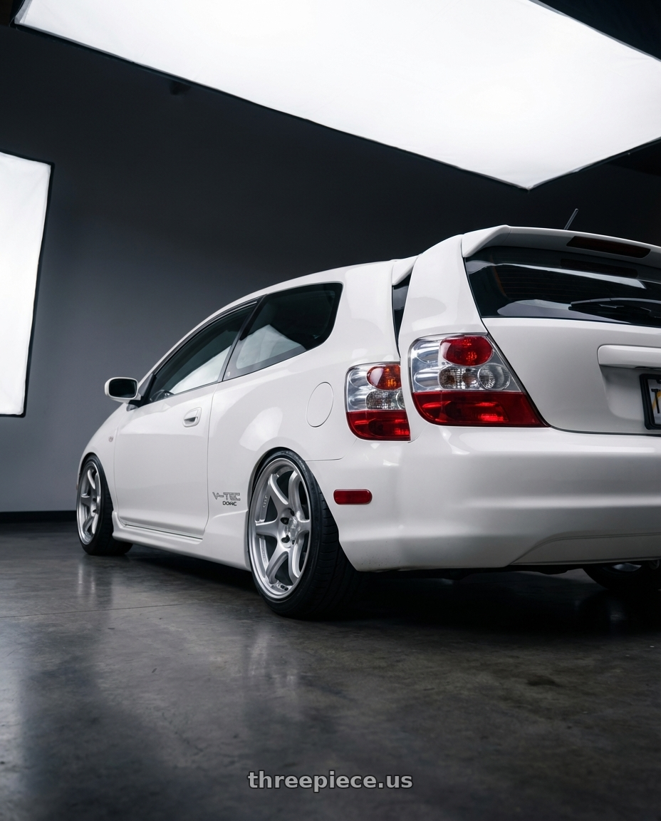 2003 ep3 si taffeta white with Kansei K11S Tandem 5x114.3 17x9 22 Hyper Silver wheels rear three quarter view slight stretch tires