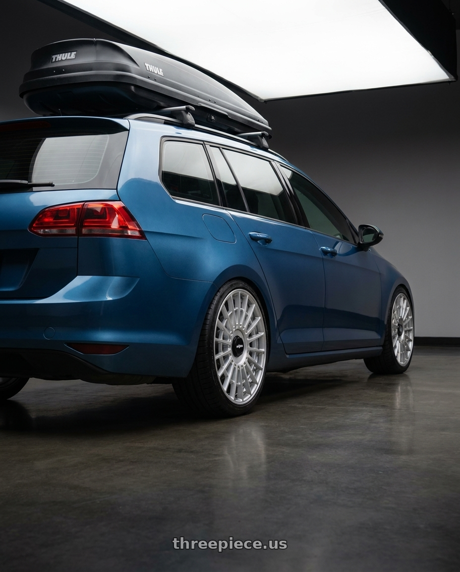 2016 VW Golf Sportwagon SE Silk Blue Metallic  with Rotiform 1PC R143 LAS-R 5X112/5X114.3 19X8.5 +45 GLOSS SILVER wheels rear three quarter view square tires