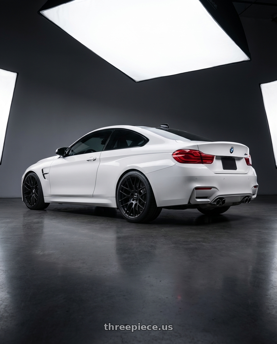 2018 BMW M4 F82 with Avant Garde Wheels M359 5X120 19x9 +35 Matte Black wheels rear three quarter view square tires