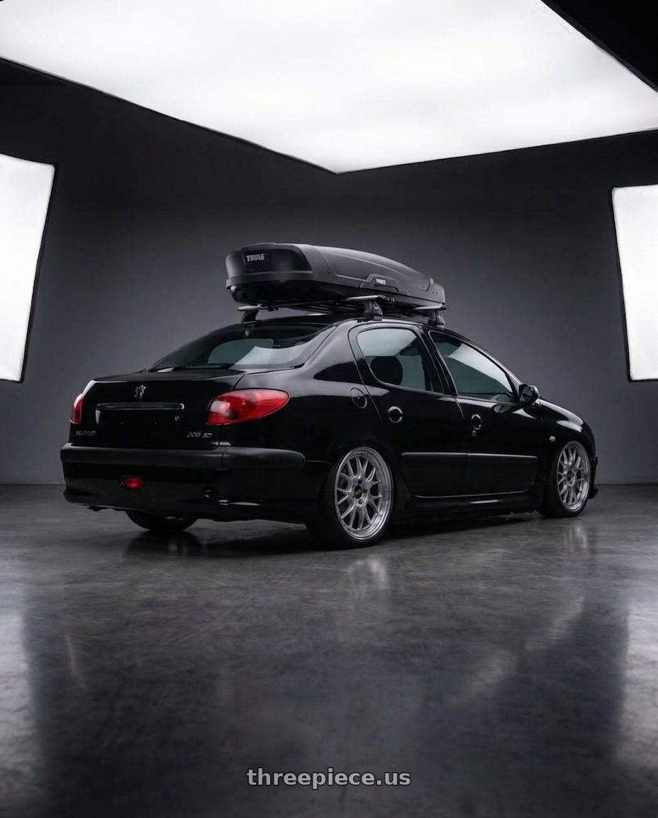 2011 Peugeot 206 SD with BBS LM-R 5x120 19x9.5+25 Diamond Silver wheels rear three quarter view square tires