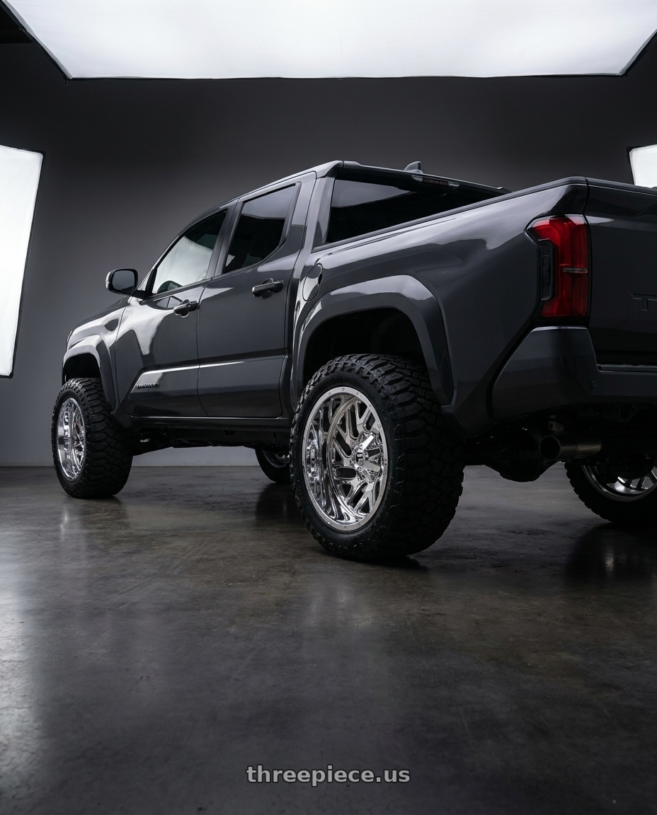 toyota tacoma 4th gen 2024 sr rwd with Fuel 2PC D210 TRITON 8X165.1 22X14 -70 CHROME PLATED wheels rear three quarter view meaty tires