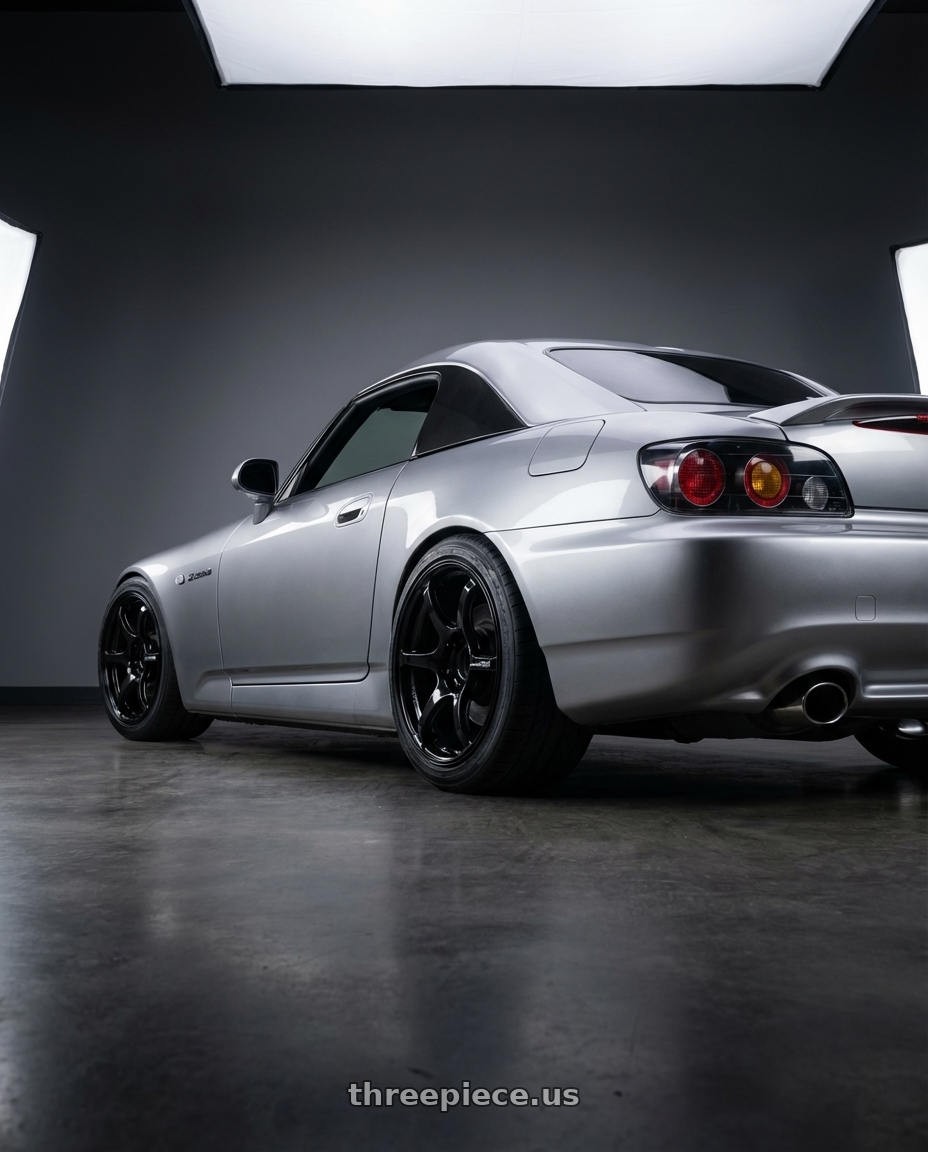 2009 Honda S2000 with Advan RGIII 5x114.3 17x9.0+45 Gloss Black wheels rear three quarter view square tires