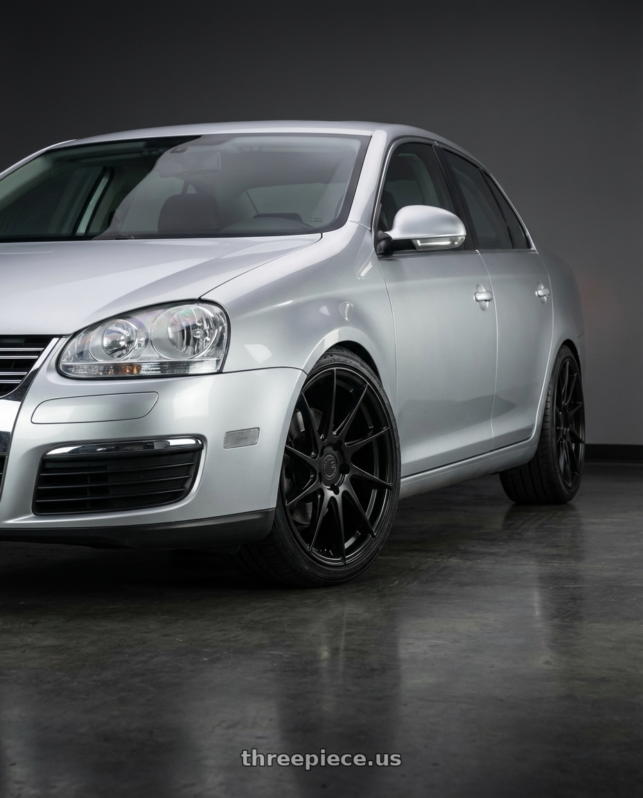 2009 Volkswagen Jetta GLI MK5 with Aodhan AH09 5x112 18x9.5 +35 Hyper Black wheels