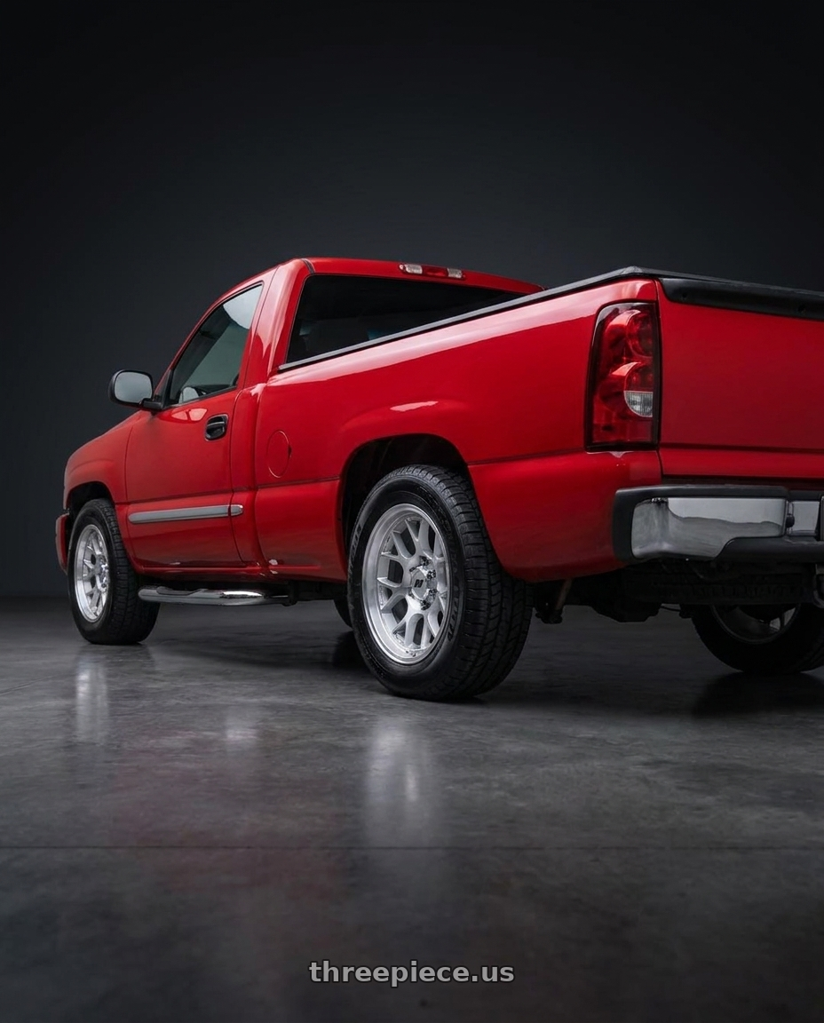 2004 gmc sierra 1500 fire with Pro Comp Alloys WRAITH 6x139.7 17x8 +20 Gloss Silver W/ Machined Face wheels rear three quarter view square tires