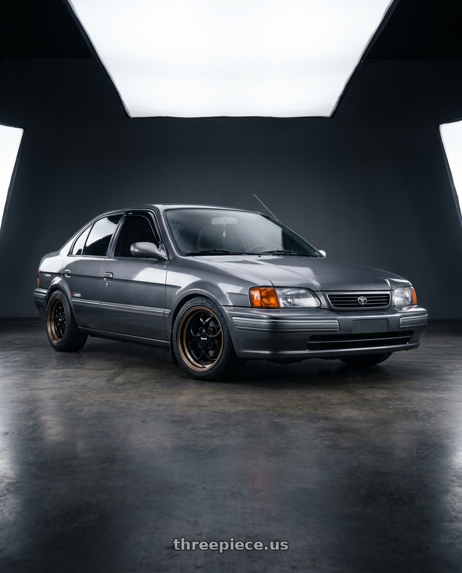 1996 Toyota Tercel EL51 with Klutch SL2 4x100 15x8.5  +17 Black Bronze Lip wheels
