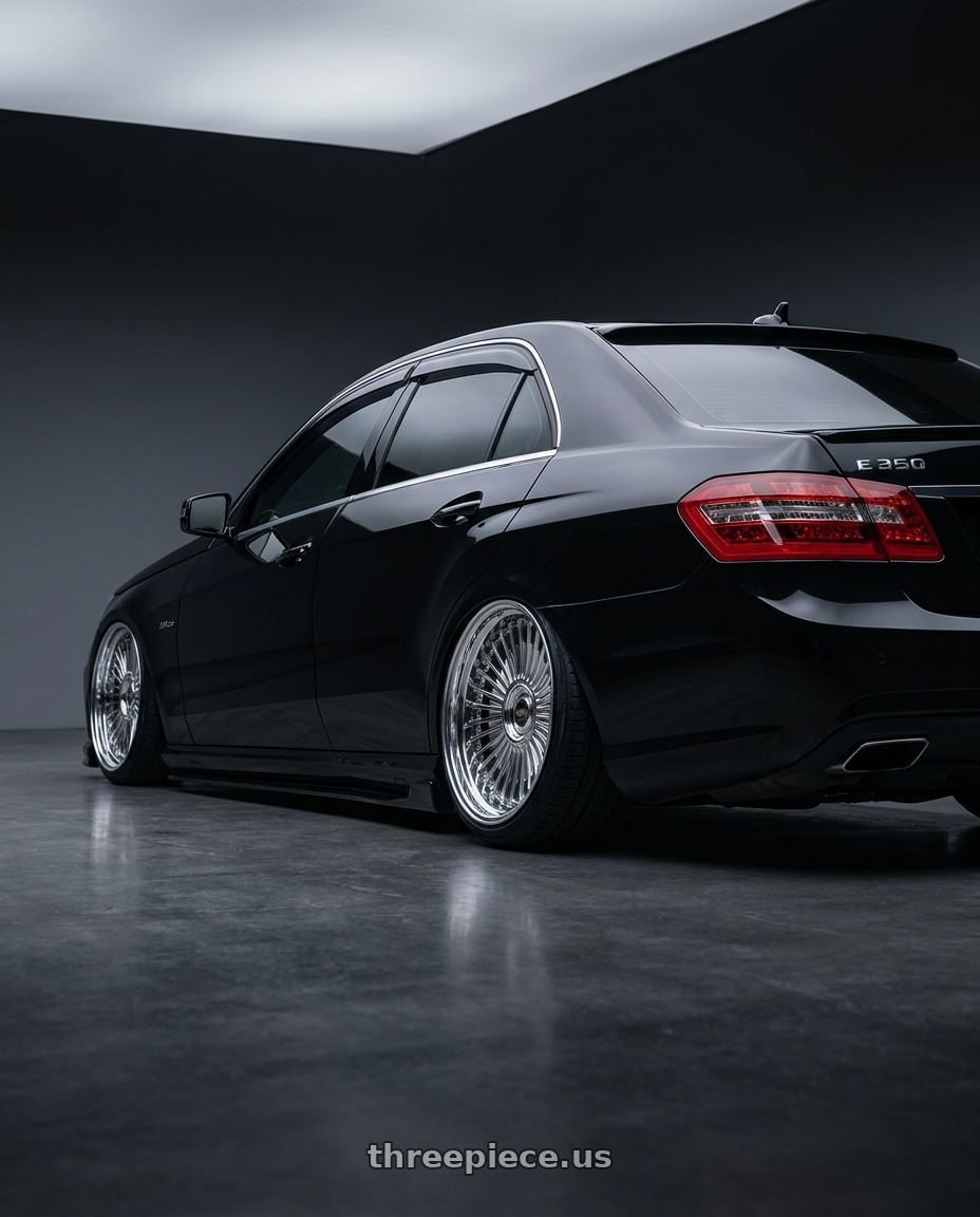 2013 Mercedes E350 Sport RWD with Work Emitz 5x112 Chrome 20x10.0 +38 wheels rear three quarter view slight stretch tires
