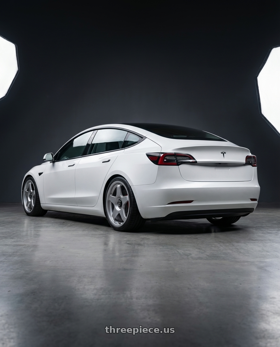 2023 Tesla Model 3 with fifteen52 CHICANE 5x114.3 / 5x120 19x8.5 +35 SPEED SILVER (GLOSS SILVER) wheels rear three quarter view square tires
