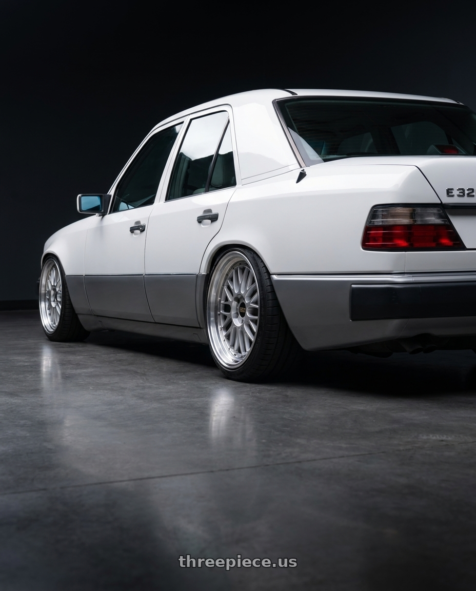1995 Mercedes E320 with BBS LM 5x114.3 17x7.5+38 Diamond Silver wheels rear three quarter view square tires