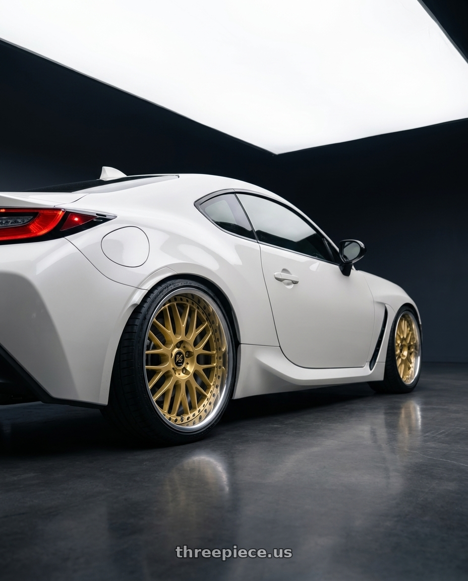 2026 Toyota gr86 with Work Vs-Xx 5x100 18x8.5+39 O Disk Gold wheels rear three quarter view square tires