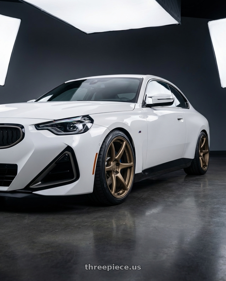 2024 BMW 2 Series G42 with Kansei K11B Tandem 5X112 19x10.5 22 Bronze wheels front three quarter view lowered stance