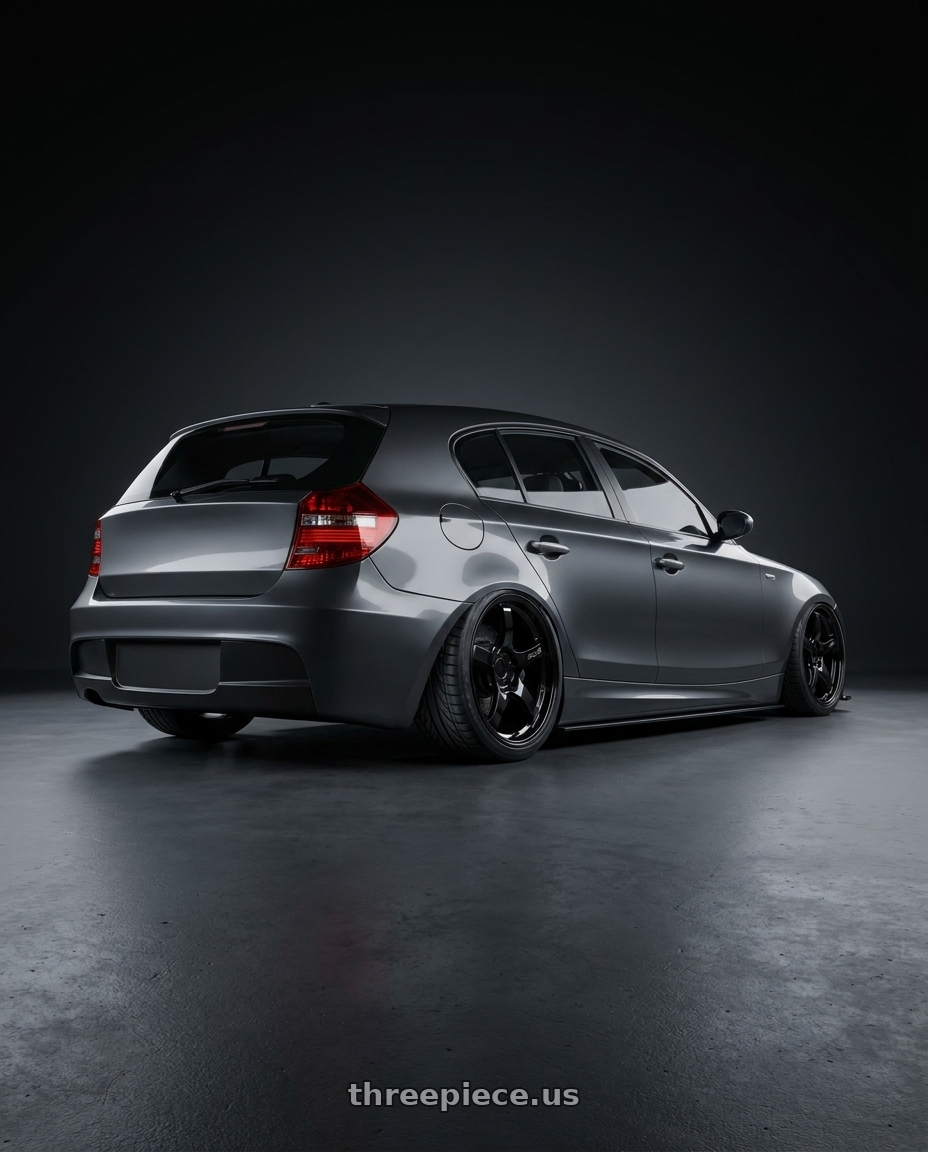2012 BMW 1 Series E82 with Gram Lights 57CR 5x120 19x10.5+22 Glossy Black wheels rear three quarter view slight stretch tires